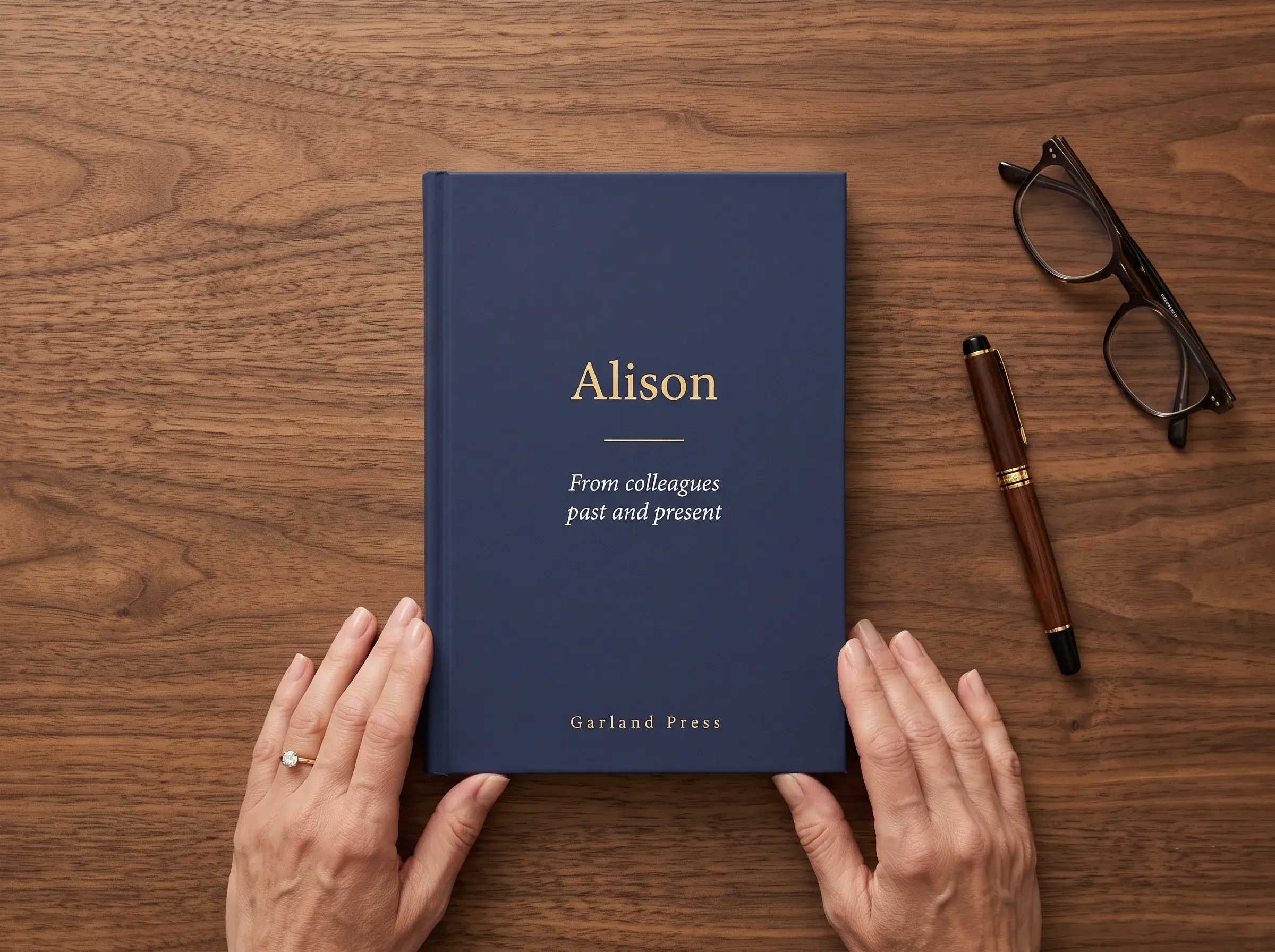 A navy cloth-bound keepsake book titled Alison in gold foil, subtitled 'From colleagues past and present', with the Garland Press imprint below